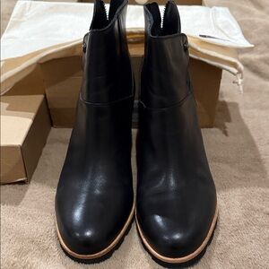 UGG Black Ankle Boots with Tan Sole